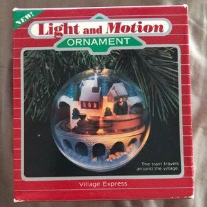 Hallmark Light and Motion Ornament Village Express